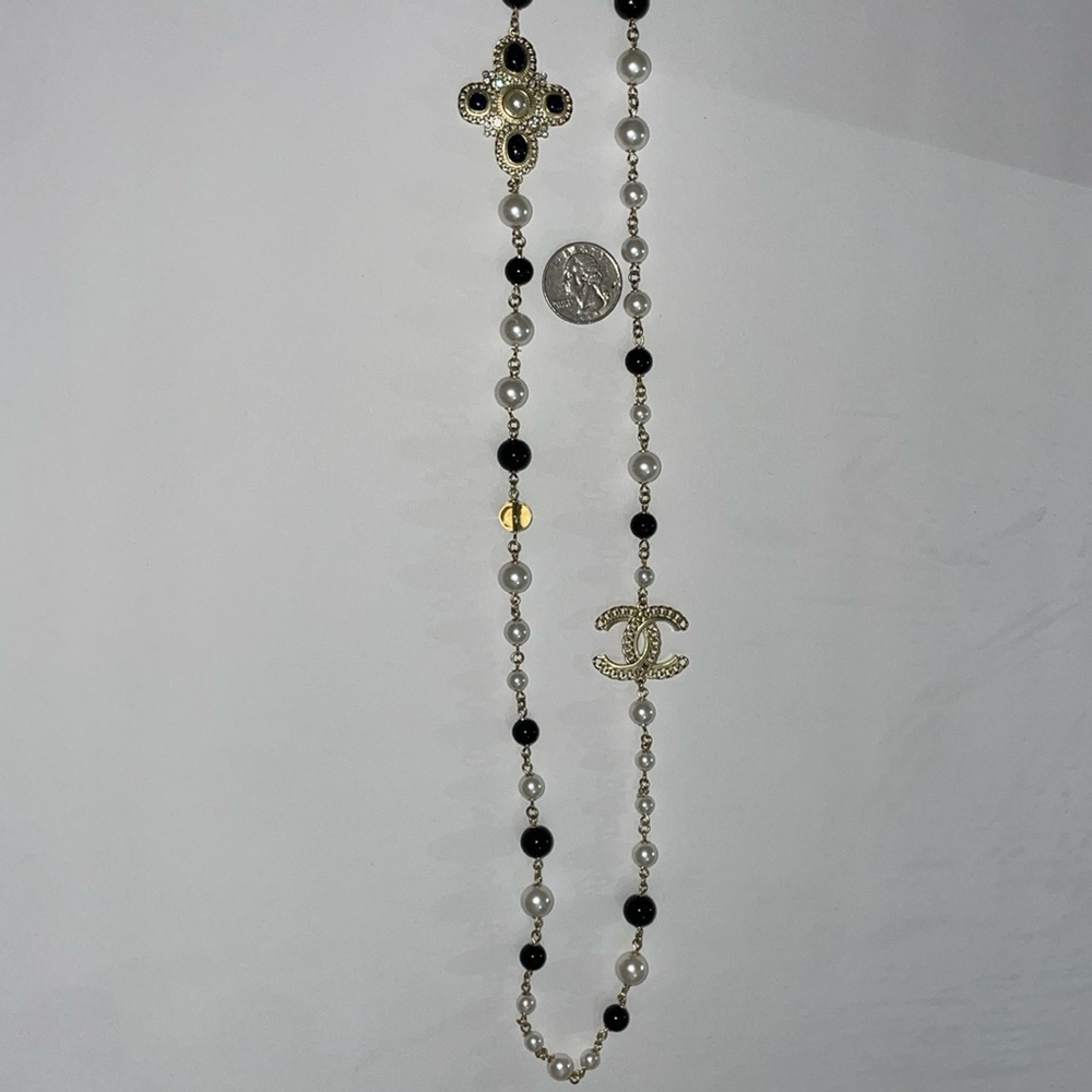 New!  Chanel long chain pearl necklace.